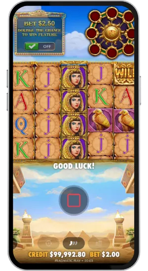 Eye of Cleopatra slot in action with reels spinning, Egyptian symbols on screen, and the demo and real money mode toggle visible